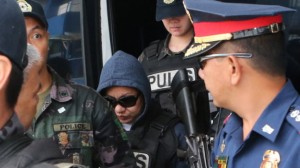 Janet Lim-Napoles escorted by the authorities. PNP photo