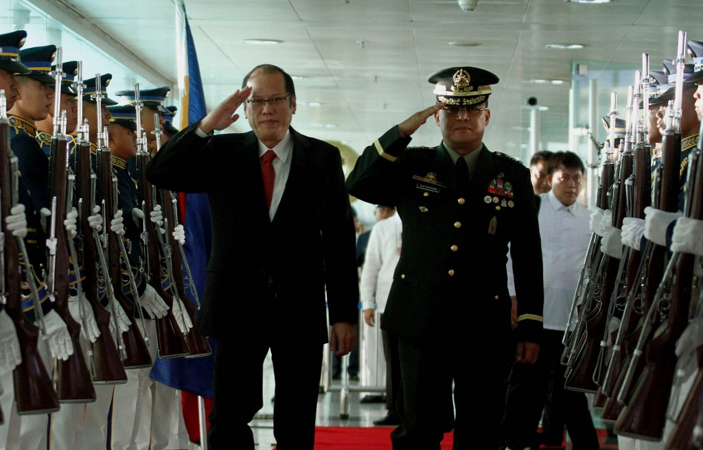 President Benigno S. Aquino III, accompanied by Armed Forces of the Philippines (AFP) Vice Chief of Staff Lt. Gen. Gregorio Pio Catapang Jr., reviews the honor guard prior to his departure from the Ninoy Aquino International Airport (NAIA) Terminal II on Tuesday (June 24, 2014) to attend the Summit Meeting & Working Lunch with Japan Prime Minister Shinzo Abe in Tokyo and the Consolidation for Peace for Mindanao Conference in Hiroshima organized by the Japan International Cooperation Agency (JICA) and the Research and Education for Peace of the Universiti Sains Malaysia. (Photo by Rolando Mailo/Malacañang Photo Bureau/PNA)