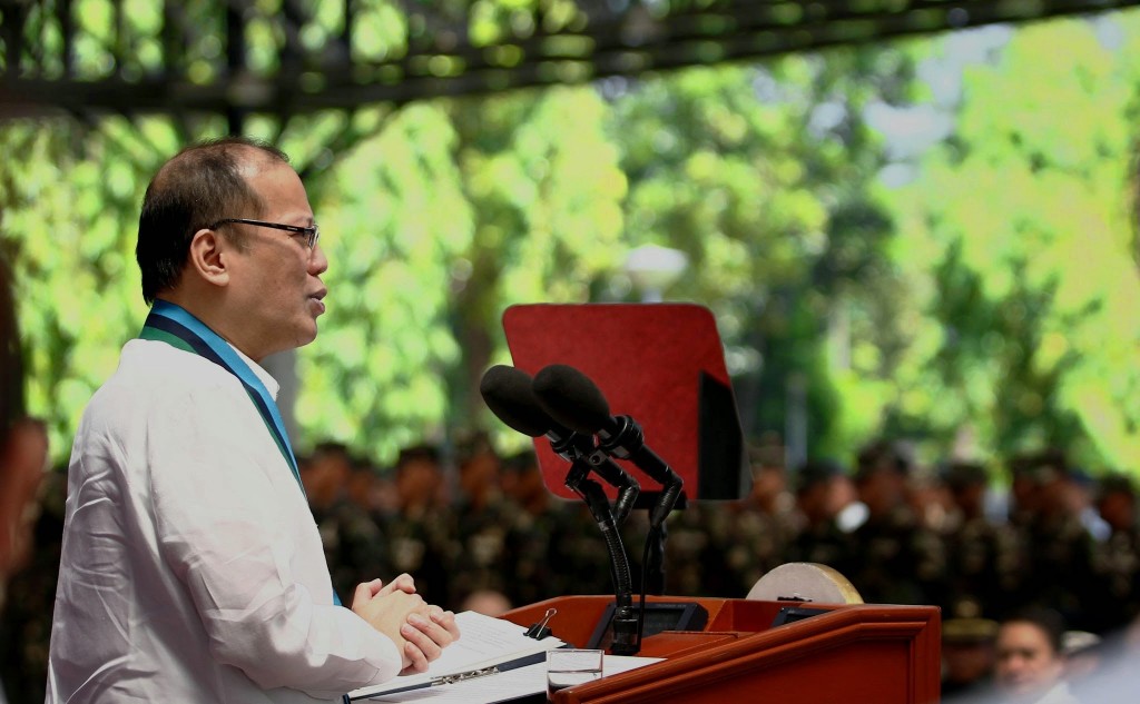 President Benigno S. Aquino III delivers his speech during the ceremonial distribution of Assault Rifles to the Philippine Army (PA) and Philippine Navy (PN) Marine troops at the Armed Forces of the Philippines (AFP) General Headquarters Canopy at Camp General Emilio Aguinaldo in Quezon City on Thursday (August 14). One of the major programs of the AFP Modernization is to upgrade the mission-essential capability requirements of the AFP in terms of firepower for the ground troops. Also in photo are Defense Secretary Voltaire Gazmin and AFP Chief of Staff General Gregorio Pio Catapang, Jr. (Photo by Rey Baniquet / Malacañang Photo Bureau)