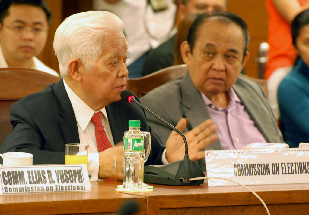 Commission on Elections (Comelec) chairman Sixto Brillantes Jr. (left) presents the proposed Comelec Budget for 2015 during the House Appropriations Committee hearing on Thursday (Sept. 4, 2014) at the House of Representatives in Batasan Hills, Quezon City. In right photo is Palawan 3rd District Rep. Douglas S. Hagedorn. (PNA photos by Gil S. Calinga)