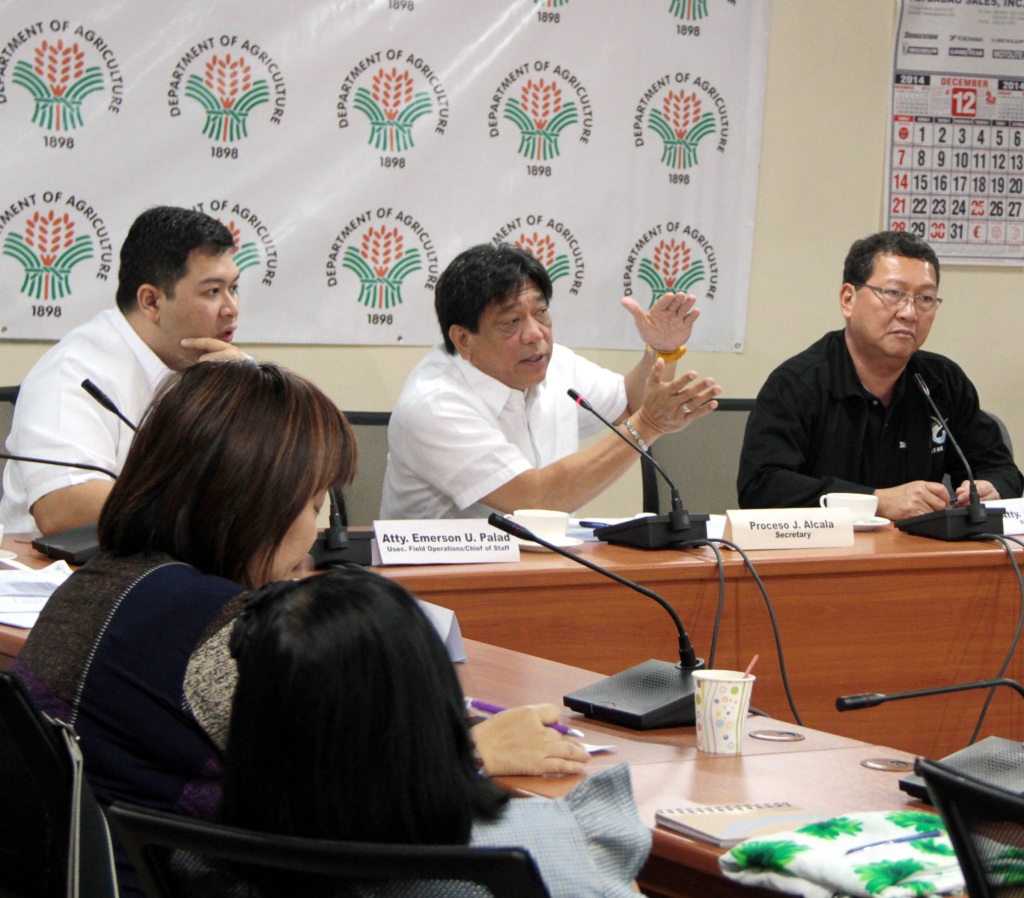 Department of Agriculture (DA) Secretary Proceso J. Alcala (center), flanked by DA Undersecretary Atty. Emerson Palad (left); and Bureau of Fisheries and Aquatic Resources (BFAR) Director Atty. Asis G. Perez, discuss updates on the effects of Typhoon "Ruby" (Hagupit) to the agriculture and fishery sectors on Monday (December 08, 2014) during a press conference at the DA office in Diliman, Quezon City. (PNA photo by Jess M. Escaros Jr.)