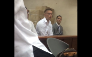 U.S. Marine Pfc. Joseph Scott Pemberton (center) attends court hearing (screengrab from footage by Atty. Harry Roque)
