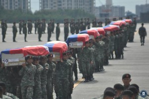 On the morning of January 29, 2015, the remains of the members of the PNP Special Action Force slain in Mamasapano arrived at the Villamor Air Base. The fallen PNP SAF were accorded arrival honors, led by the Secretary of the Interior and Local Government Mar Roxas, PNP Deputy Dir. Gen. Leonardo Espina, and AFP Chief of Staff Gen. Gregorio Catapang. (Presidential Communications Development and Strategic Planning Office)