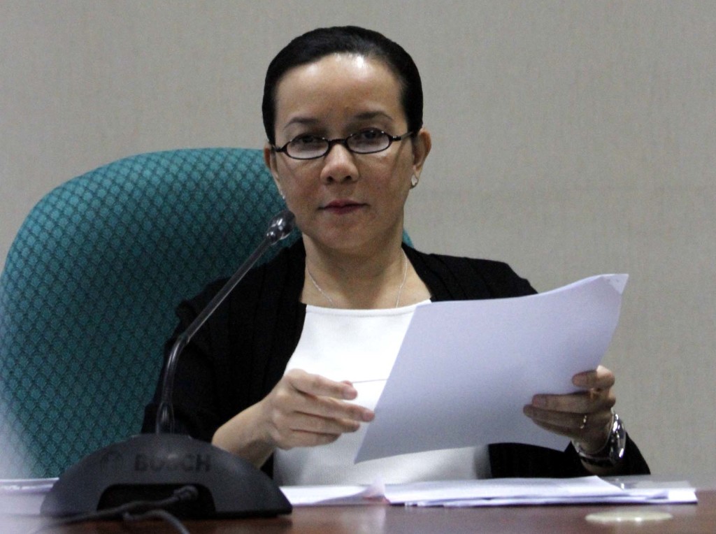 Senator Grace Poe, chairperson of the Senate Committee on Public Order and Dangerous Drugs, holds a copy of the Senate Committee Report on the Mamasapano Incident Investigation during a press conference on Tuesday (March 17, 2015) at the Senate Bldg. in Pasay City (PNA photo by Avito C. Dalan)