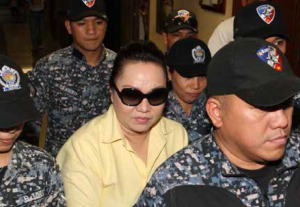 Makati City Regional Trial Court (RTC) Branch 150 Judge Elmo Alameda sentences alleged pork barrel scam mastermind Janet Lim Napoles (in yellow polo shirt) to a jail term of up to 40 years after finding her guilty of illegally detaining her former employee, whistle-blower Benhur Luy, on Tuesday (April 14, 2015). Judge Alameda also ordered Napoles to pay Luy PhP50,000 as civil indemnity and PhP50,000 as moral damages. The court likewise ordered Napoles' transfer from Camp Bagong Diwa in Taguig City to the Correctional Institution for Women in Mandaluyong City. (PNA photo by Avito C. Dalan)