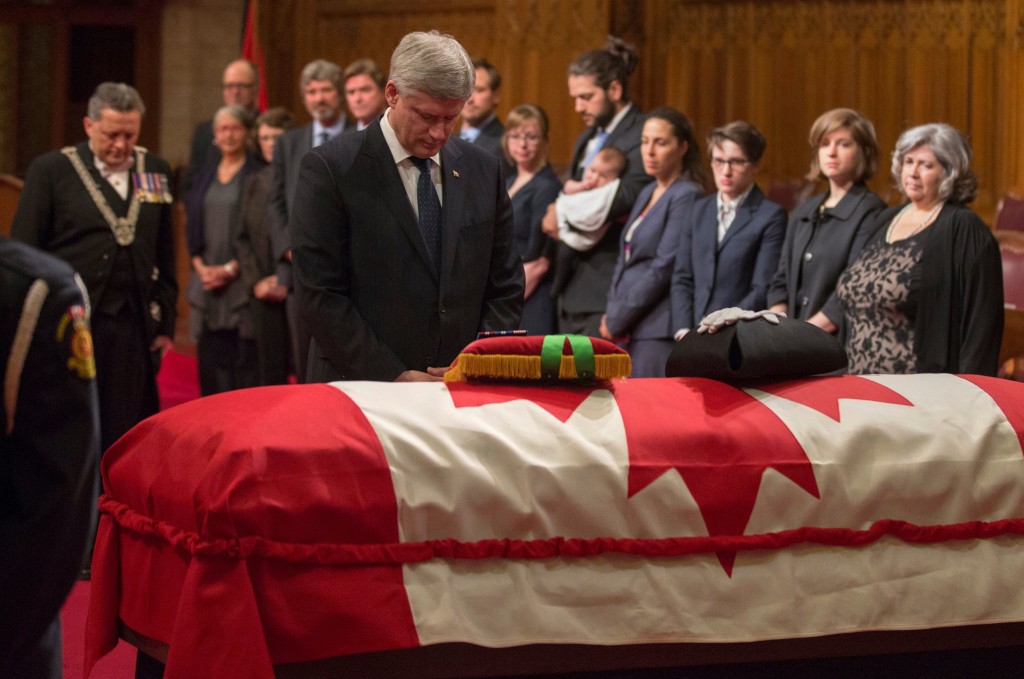 Ottawa – Prime Minister Stephen Harper pays his respects to the late Honourable Pierre Claude Nolin, Speaker of the Senate, during a special ceremony in the Senate Chamber. (PMO photo by Jason Ransom / pm.gc.ca)