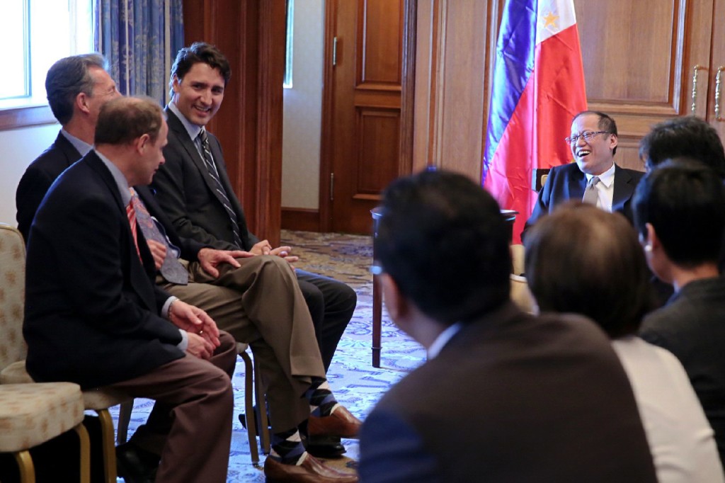 The Leader of the Liberal Party of Canada, Justin Trudeau, and Liberal MPs John MacKay and Kevin Lamoureux meet with the President of the Philippines, Benigno Aquino III, in Toronto.