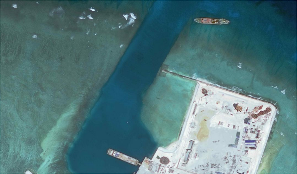 Since 2014, China has been building an artificial island at Calderon Reef (Cuarteron Reef) and is also building structures on the island. (Photo courtesy of Asia Maritime Transparency Initiative)
