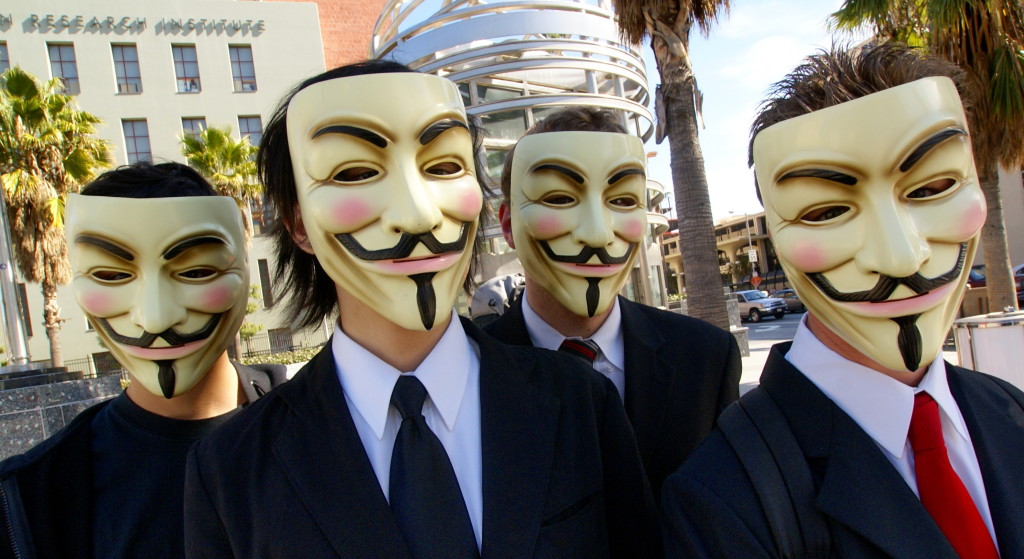 Anonymous with Guy Fawkes masks at the Scientology area in Los Angeles  (Photo from Wikipedia/Vincent Diamante)