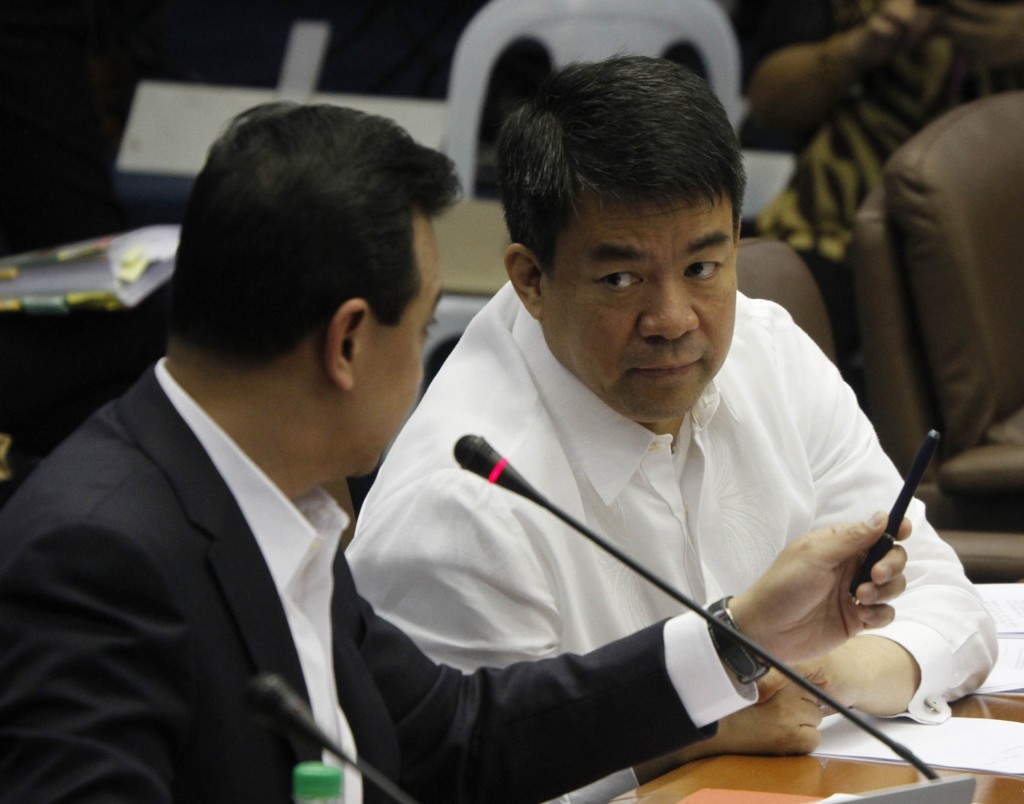 Senator Aquilino Pimentel III (2nd from left), chairperson of the Senate Blue Ribbon Subcommittee, confers with Senator Antonio Trillanes IV during the Senate hearing on the alleged overpricing of the Makati City Hall Parking Building II and related anomalies in Makati City on Tuesday (July 7, 2015). (Avito C. Dalan / PNA)