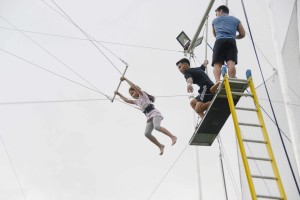 Flying Trapeze Philippines guest trying out the calisthenics bars