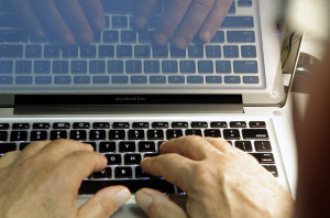 This photo illustration shows hands typing on a computer keyboard on Wednesday Feb. 27,2013. Security threats aren't new and have long been part of online life. But the increased attention on them offers a good time to review ways you can protect yourself. (AP Photo/Damian Dovarganes) ORG XMIT: LA110 ORG XMIT: POS1302271645350001 ORG XMIT: POS1303111420164135