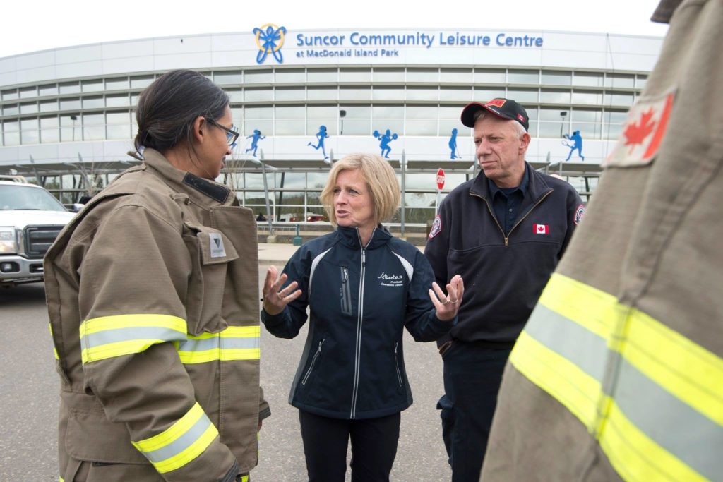 Premier Rachel Notley met with the first responders and Fire Chief Darby Allen in Fort McMurray, thanking them for their efforts in battling the fires. (Facebook photo)