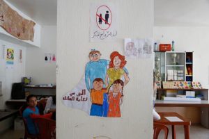 Drawings by young Syrian refugee girls in a community centre in southern Lebanon promote the prevention of child marriage. (Photo By DFID - UK Department for International Development, CC BY 2.0)