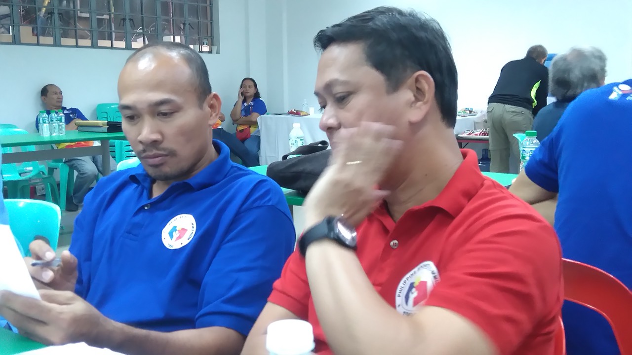 DIRECTION. Philippine Sports Commissioner Charles Raymond A. Maxey (right) listens to Philippine Sports Institute (PSI) Socsksargen coordinator Henry Dagmil during a workshop on formulating targets for 2018 as the PSI Coordinators' Meeting and Workshop came to a close at the Multipurpose Hall Dorm G, PhilSports Complex in Pasig City on November 29, 2017. (PSC-PSI Photo)