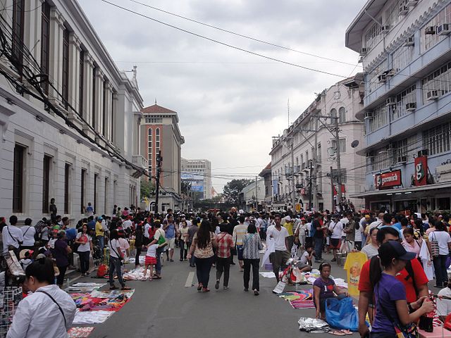 Street scene near Plaza Roma along A. Soriano Avenue, Intramuros, Manila during the papal visit of Pope Francis in January 2015. (Photo By Patrickroque01 at English Wikipedia, CC BY-SA 3.0)