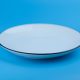 White plate on blue background
