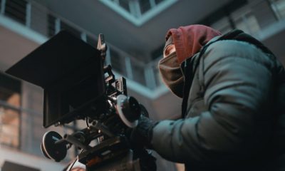 Man working behind the camera