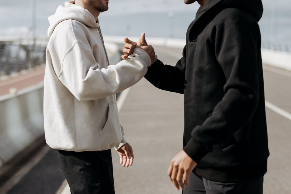 Handshakes and hugs are good for you – it’s vital they make a comeback ...