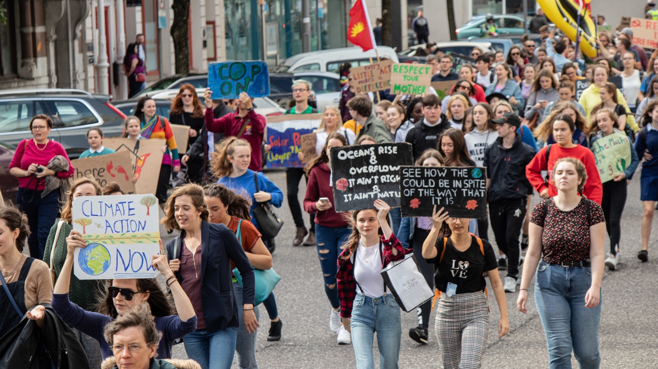 Crowd of People Marching on a Rally