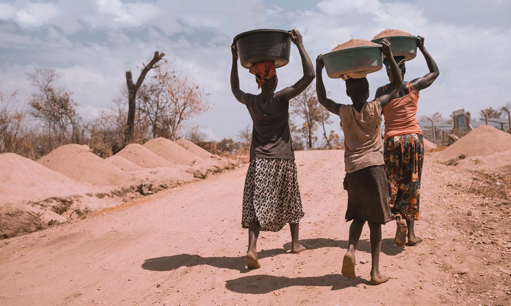 Ugandans walking in Rhino Refugee camp