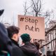 Protester holding "#StopPutin" sign