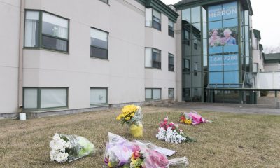 Flowers are shown outside Maison Herron, a long term care home in the Montreal suburb of Dorval