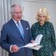 Prince Charles is flanked by Camilla