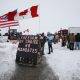 People block highway 75 with heavy trucks and farm equipment and access to the Canada/US border crossing at Emerson, Man., Thursday, Feb. 10, 2022.