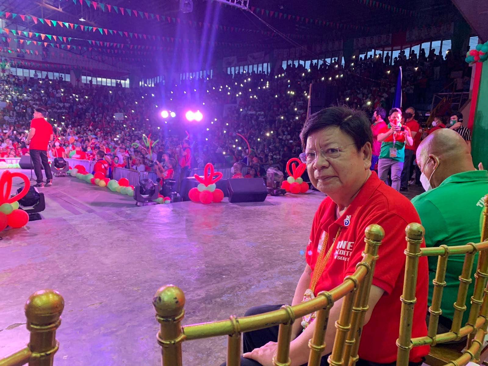 Rodante Marcoleta sits on stage during a BBM rally