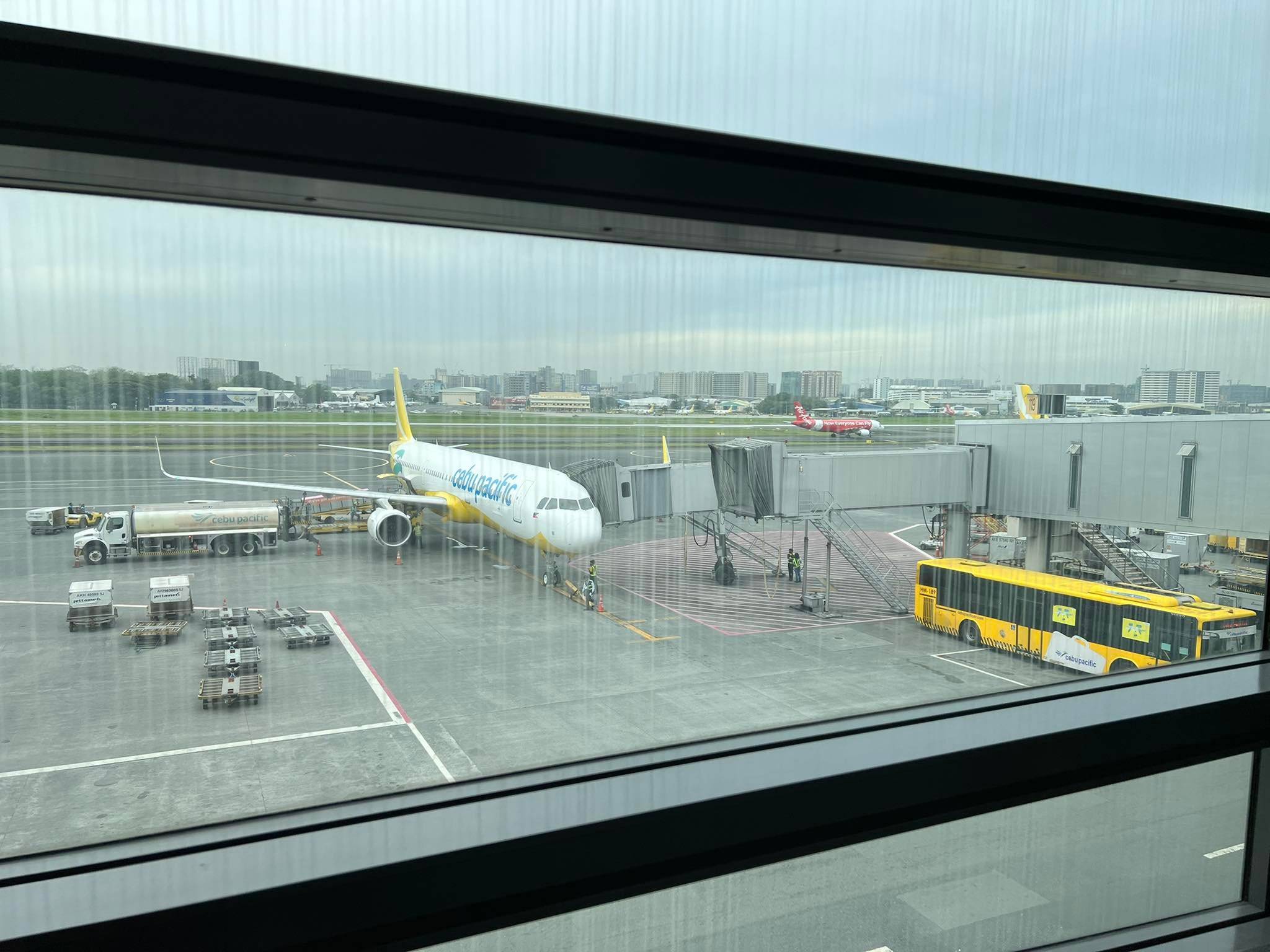 View of the runway inside departure area in NAIA Terminal 3.