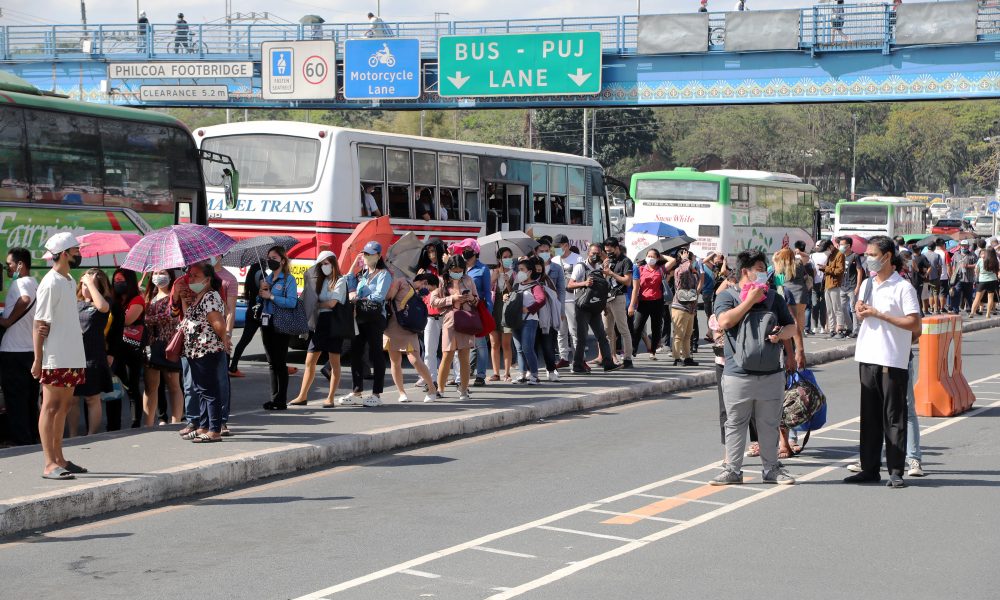 Public commuters lined up on Commonwealth Avenue