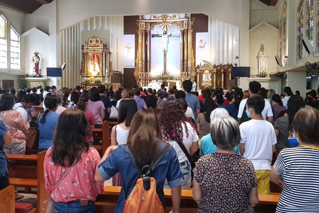 Catholic devotees attend the Easter Sunday