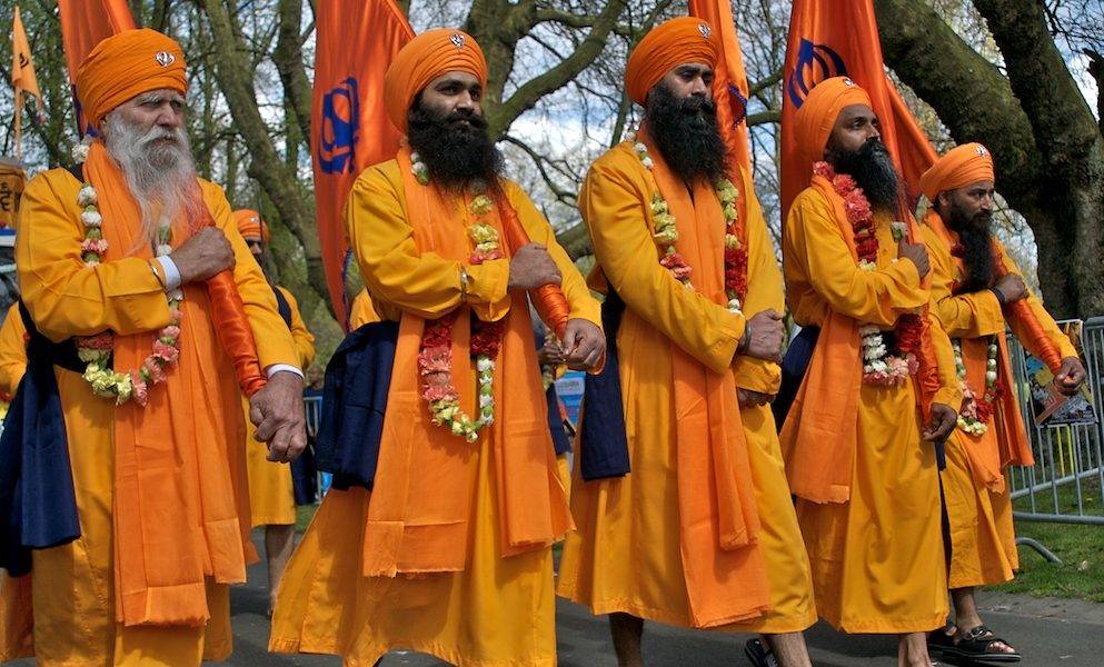 Sikh men in orange