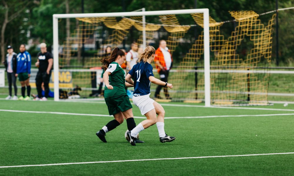 Women playing soccer