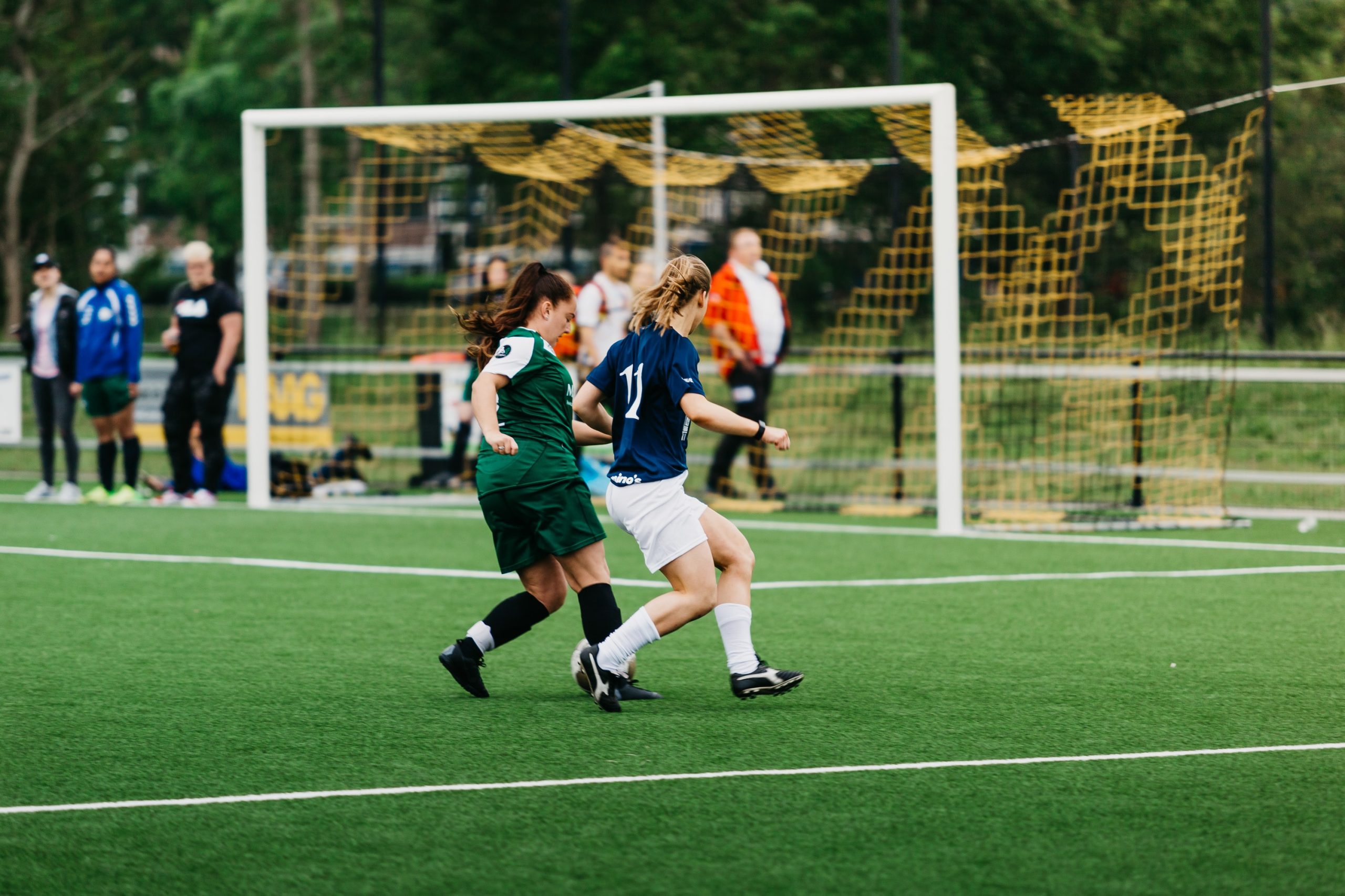 Women playing soccer