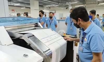 comelec staff printing official ballots for election