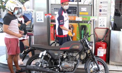 Pumping fuel at a gasoline station