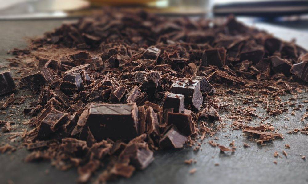Chunks of chocolate on table