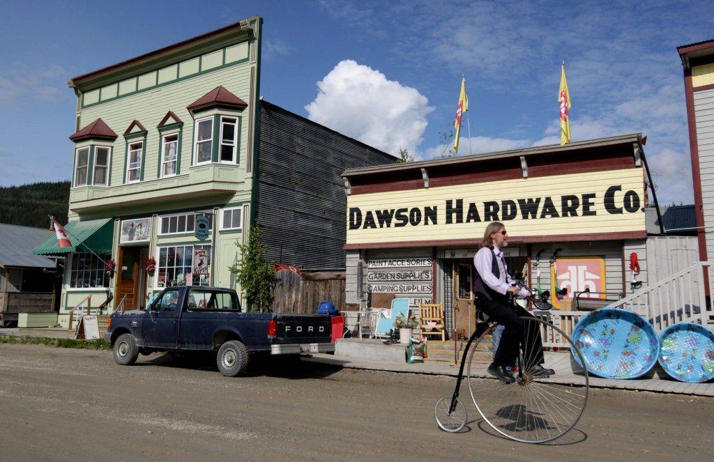 Man Riding a Bike in Dawson City