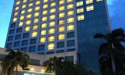 Building with lit windows forming a heart shape