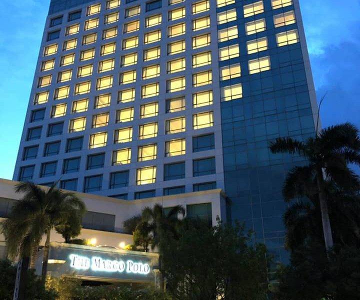 Building with lit windows forming a heart shape