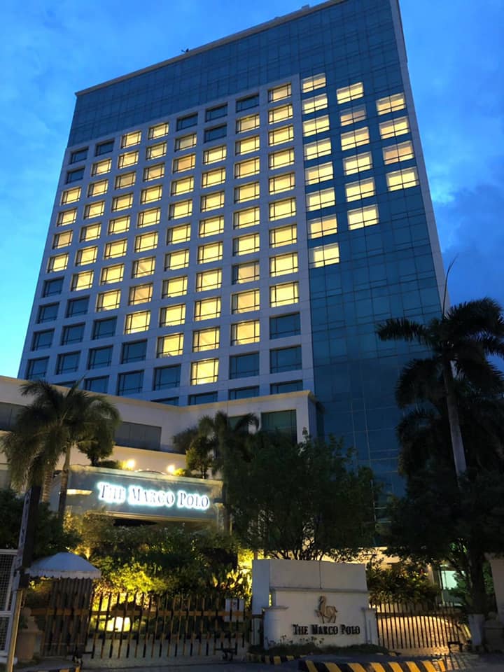 Building with lit windows forming a heart shape