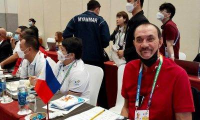 Ramon Fernandez wearing a red shirt