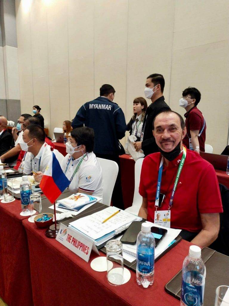 Ramon Fernandez wearing a red shirt