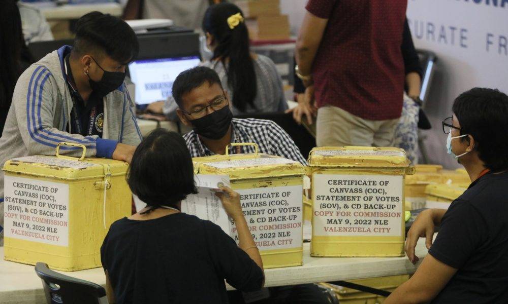 City election officers present the ballot boxes from Valenzuela City