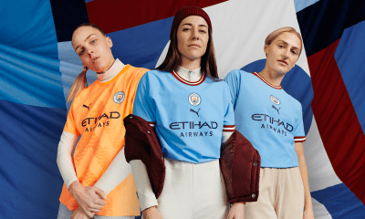 3 ladies wearing ETIHAD shirts