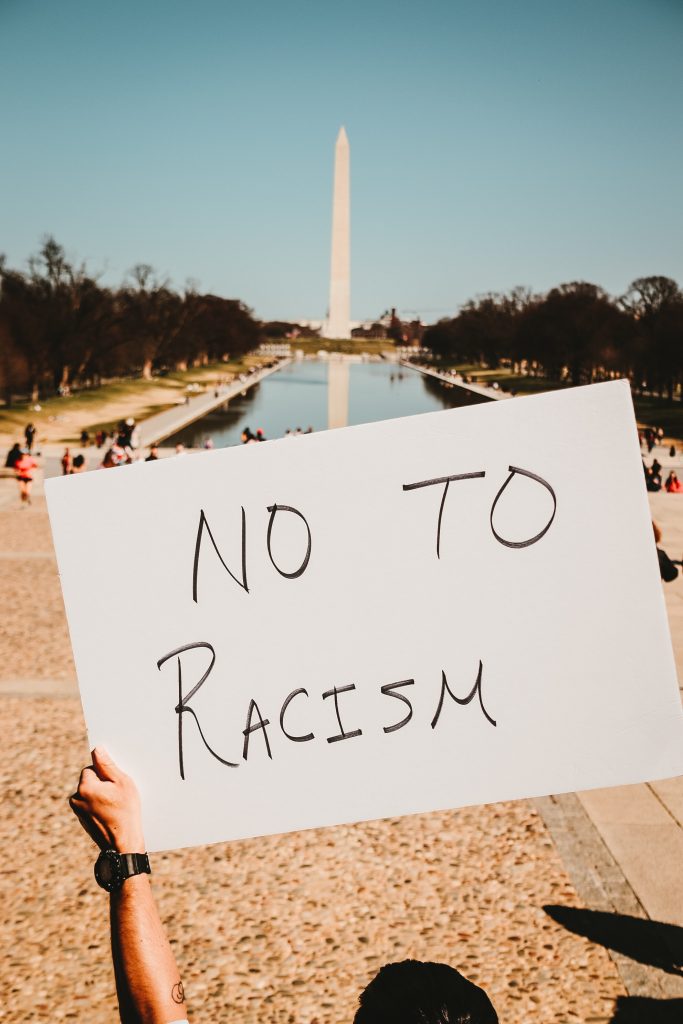 No to racism placard