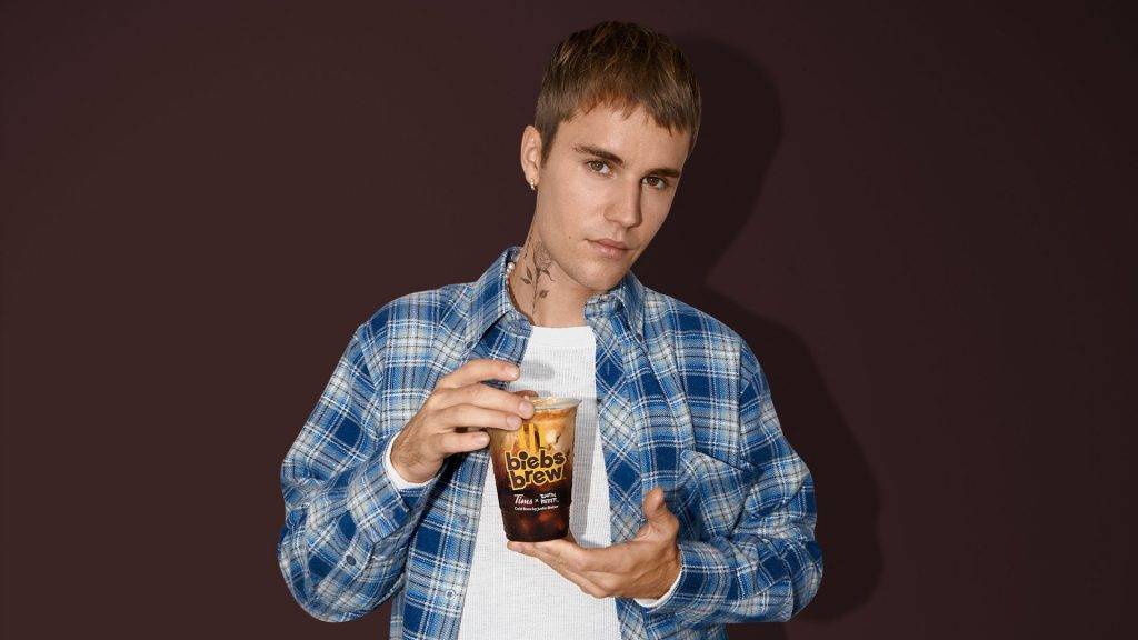 Justin Bieber holding Tim Horton's Biebs Brew