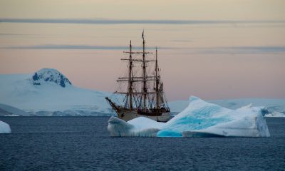 brown ship in antartica